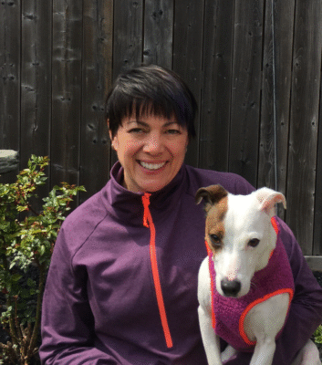 katie & patch wearing matching purple and pink coats
